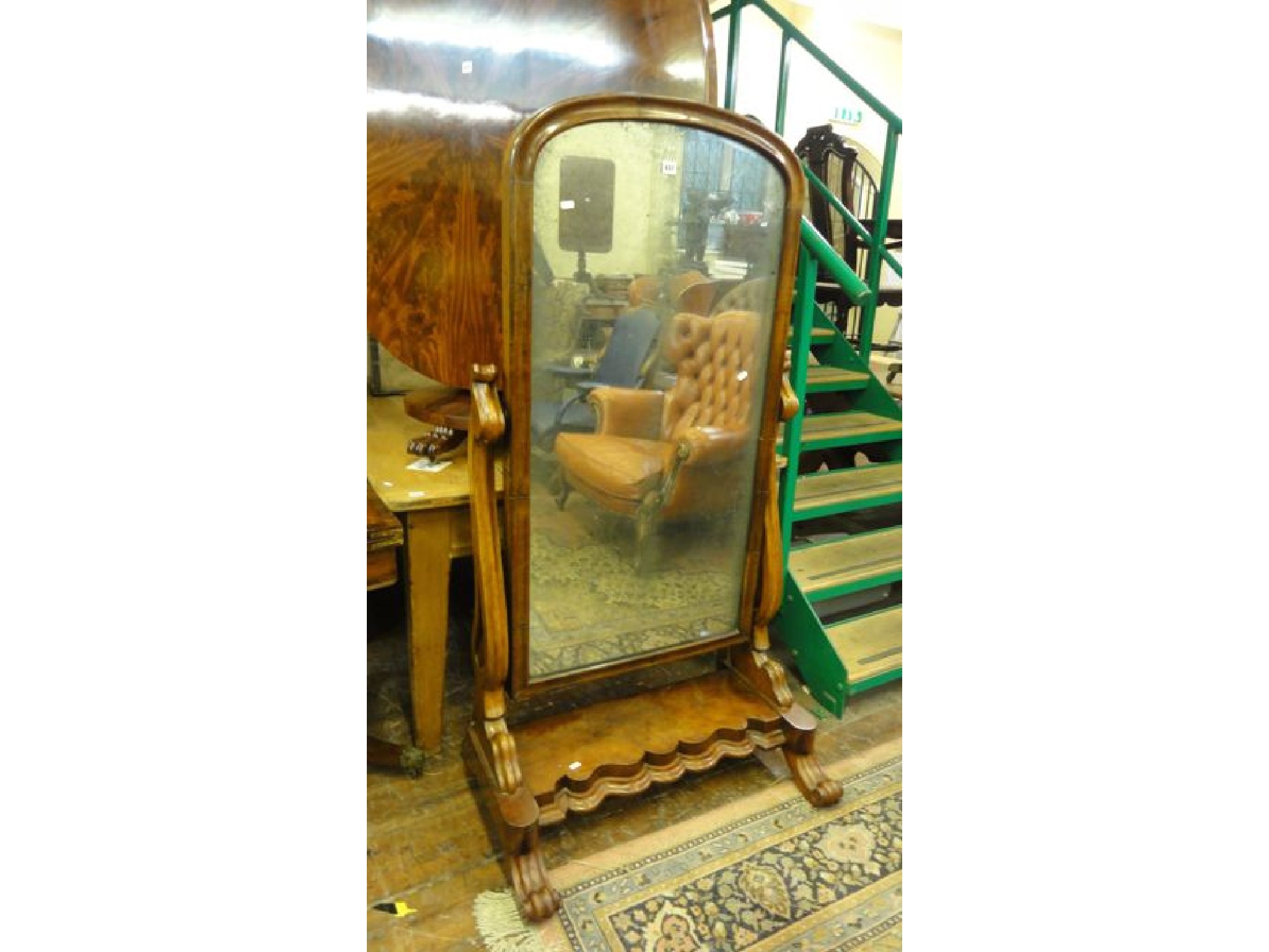 Appraisal: A Victorian cheval glass the mirror of full height raised