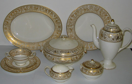 Appraisal: WEDGWOOD PORCELAIN DINNER SERVICE Florentine-Gold pattern set for twelve comprising