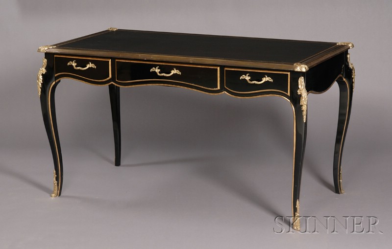 Appraisal: Louis XV Style Brass-mounted and Ebonized Leather-top Writing Table th