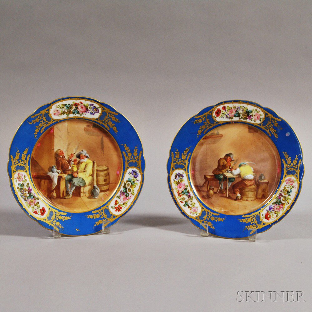 Appraisal: Pair of Sevres-style Plates th century with floral-decorated blue ring