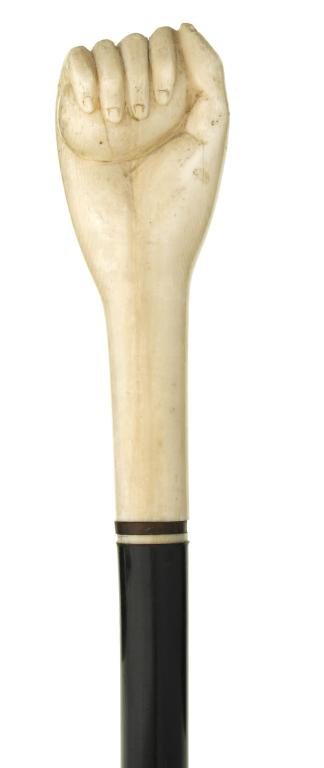 Appraisal: A VICTORIAN IVORY HANDLED EBONY CANE the long handle carved