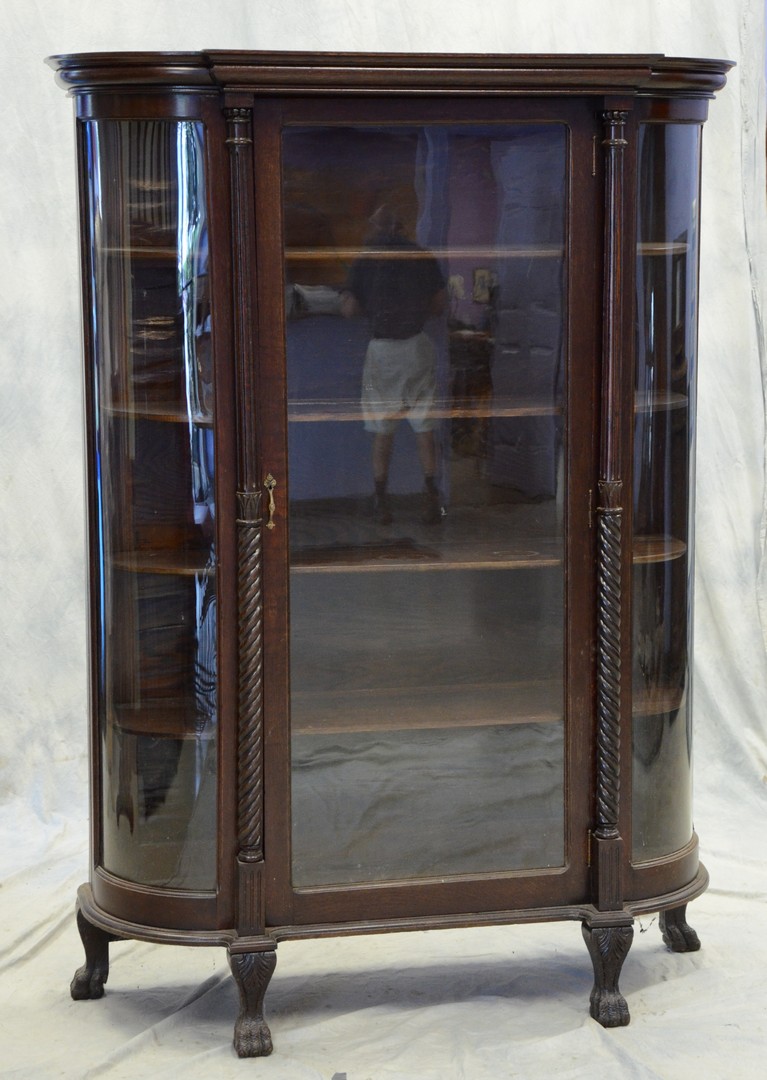 Appraisal: Oak round side china cabinet with fluted and spiral turned