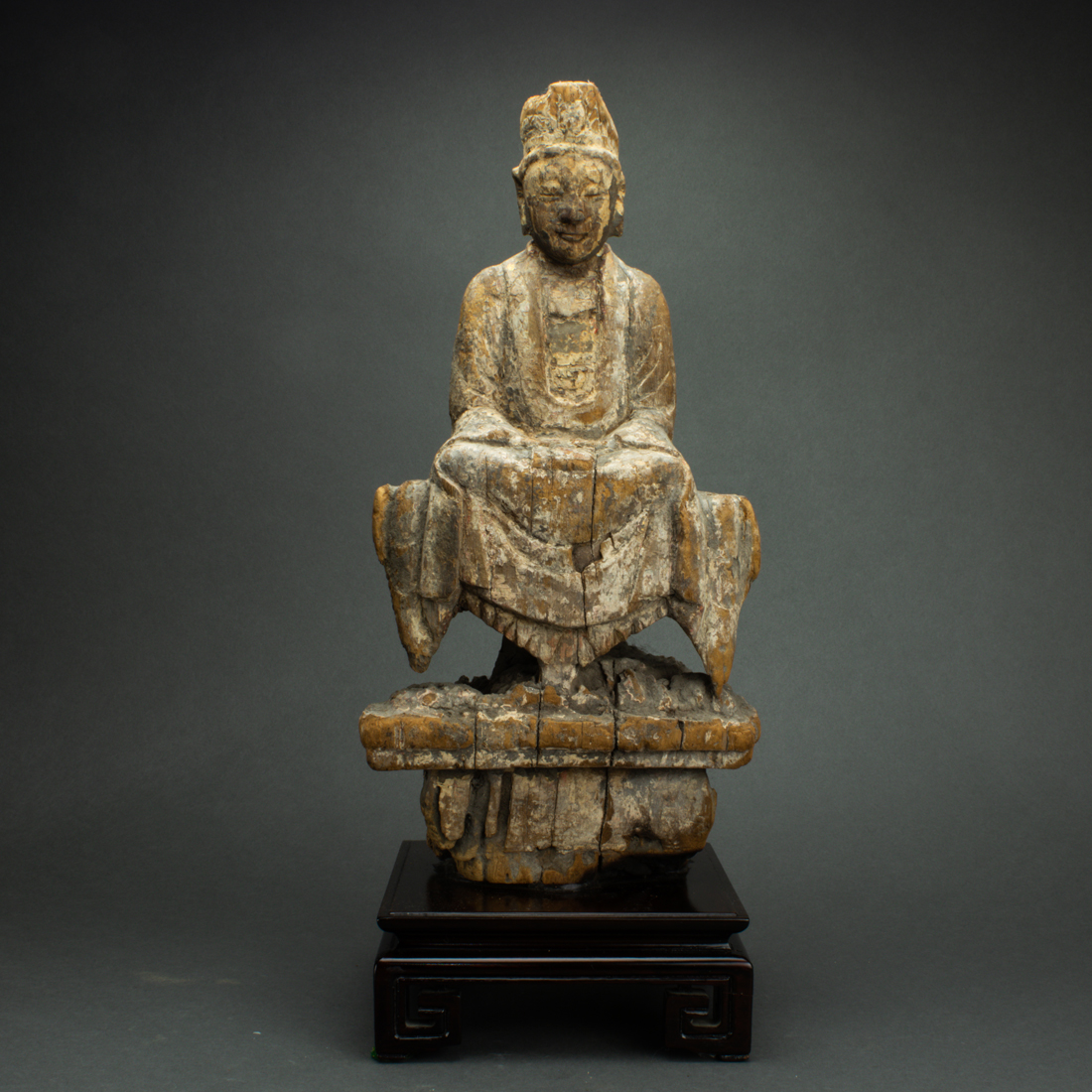 Appraisal: WOOD CARVING OF GUANYIN Wood carving of Guanyin with later