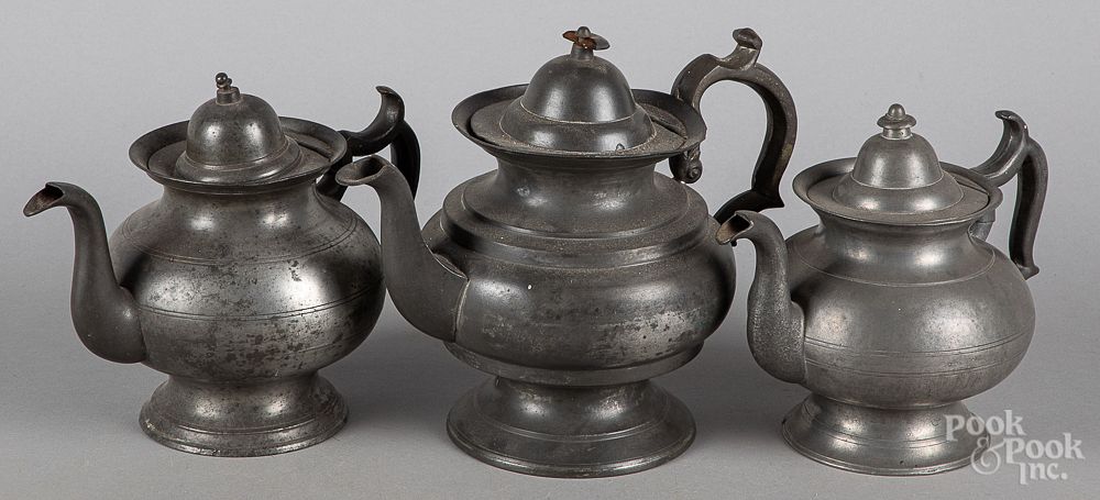 Appraisal: Three American pewter teapots th c Three American pewter teapots