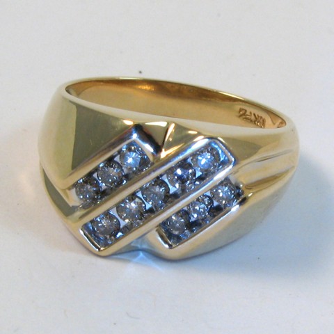 Appraisal: MAN'S DIAMOND AND TEN KARAT GOLD RING set with eleven