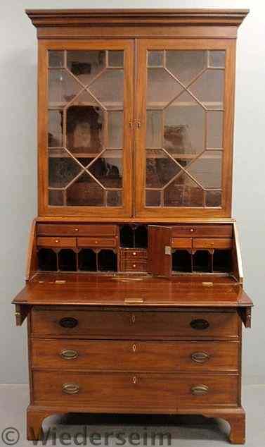 Appraisal: American inlaid mahogany two-part secretary bookcase c with a molded