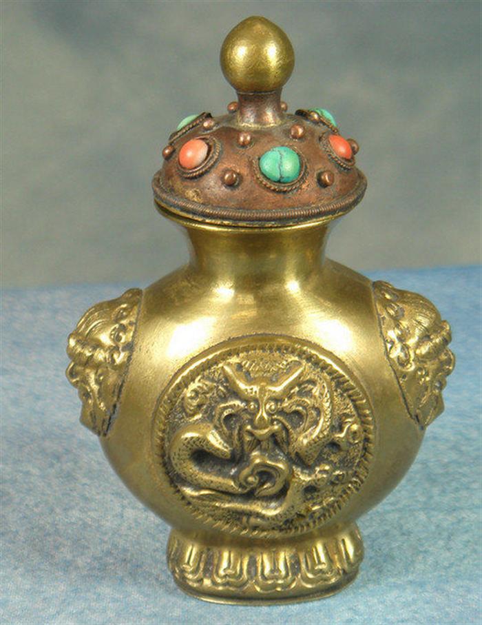 Appraisal: Silvered brass Chinese snuff bottle the body with foo dog