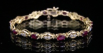 Appraisal: Ladies' Ruby Diamond Bracelet A k yellow gold link bracelet