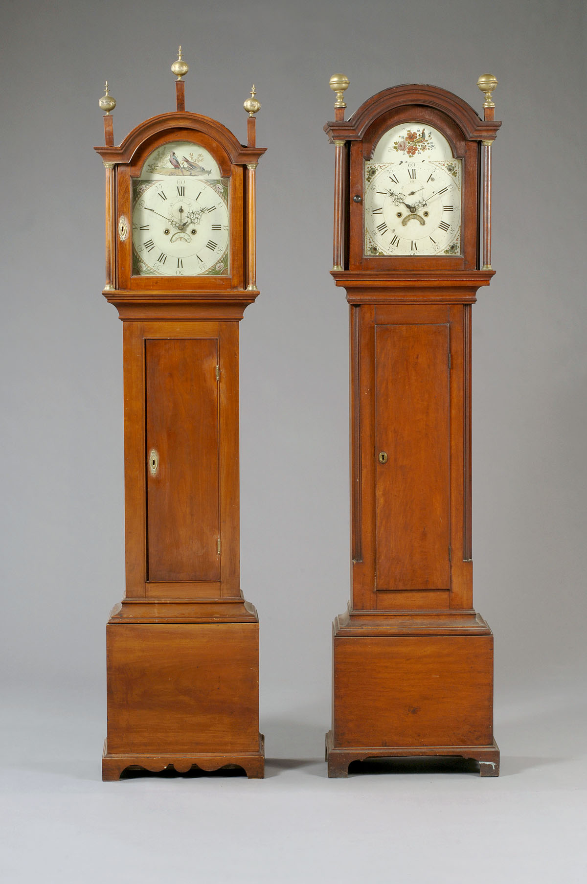 Appraisal: NEW ENGLAND CHIPPENDALE MAPLE TALL-CASE CLOCK The molded arched crest