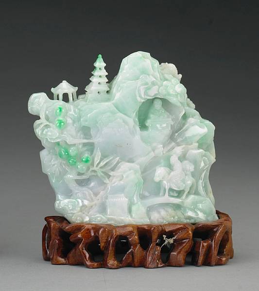 Appraisal: A small mottled green jadeite mountain th Century Depicting to