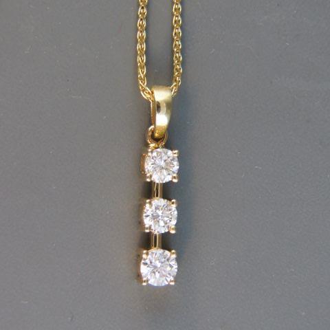 Appraisal: Diamond Pendant a trio of diamondstotaling carat representing Past present