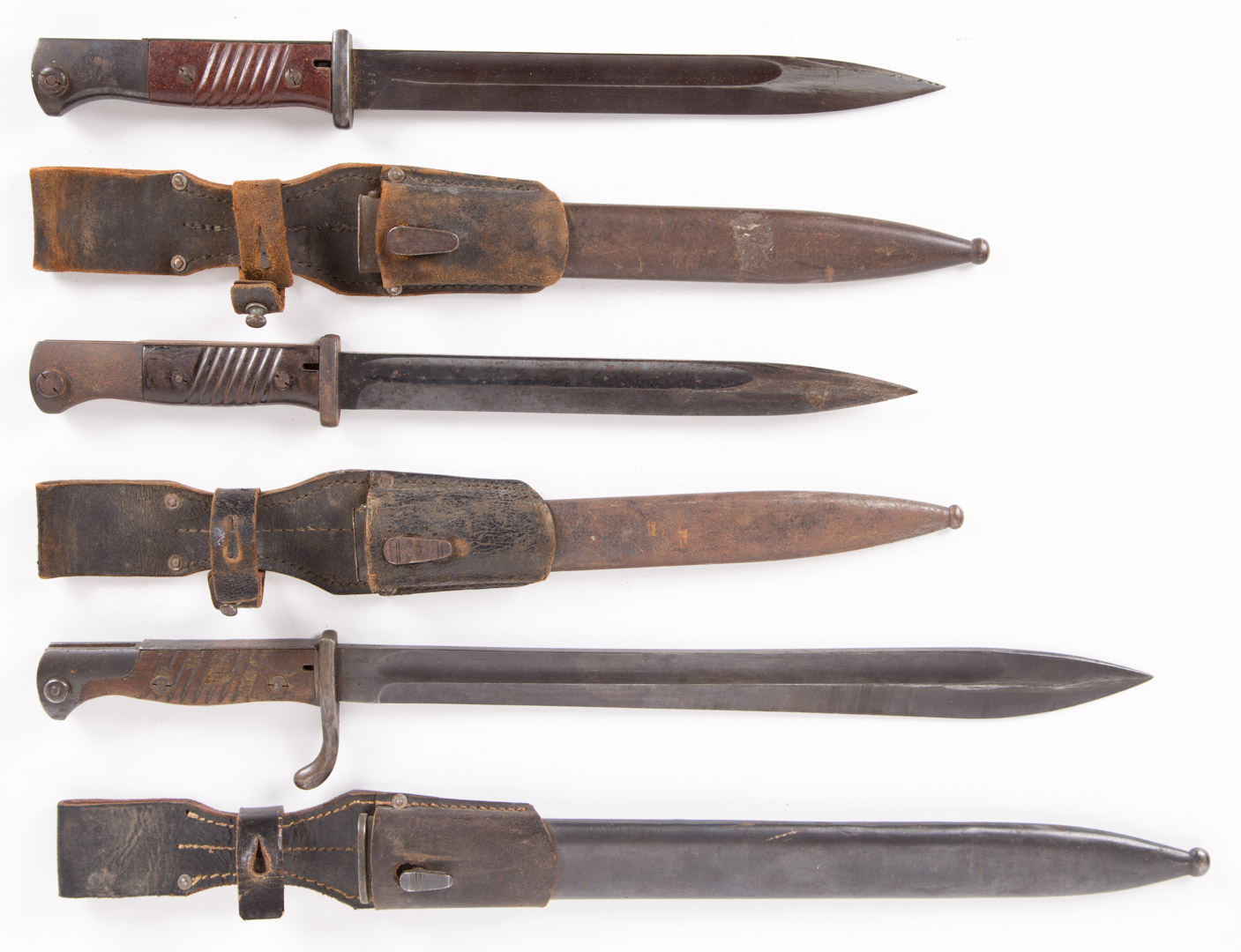 Appraisal: German bayonets with scabbards frogs first possibly model - blade