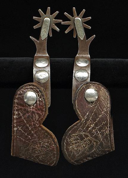 Appraisal: A pair of silver-mounted Texas style spurs by Crockett circa