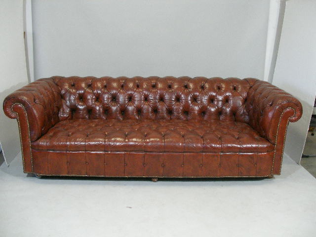 Appraisal: Leather Chesterfield Sofa c 's rich burnt sienna colored tufted