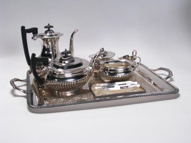 Appraisal: Vintage five-piece Sheffield silverplate tea service with coffee pot tea