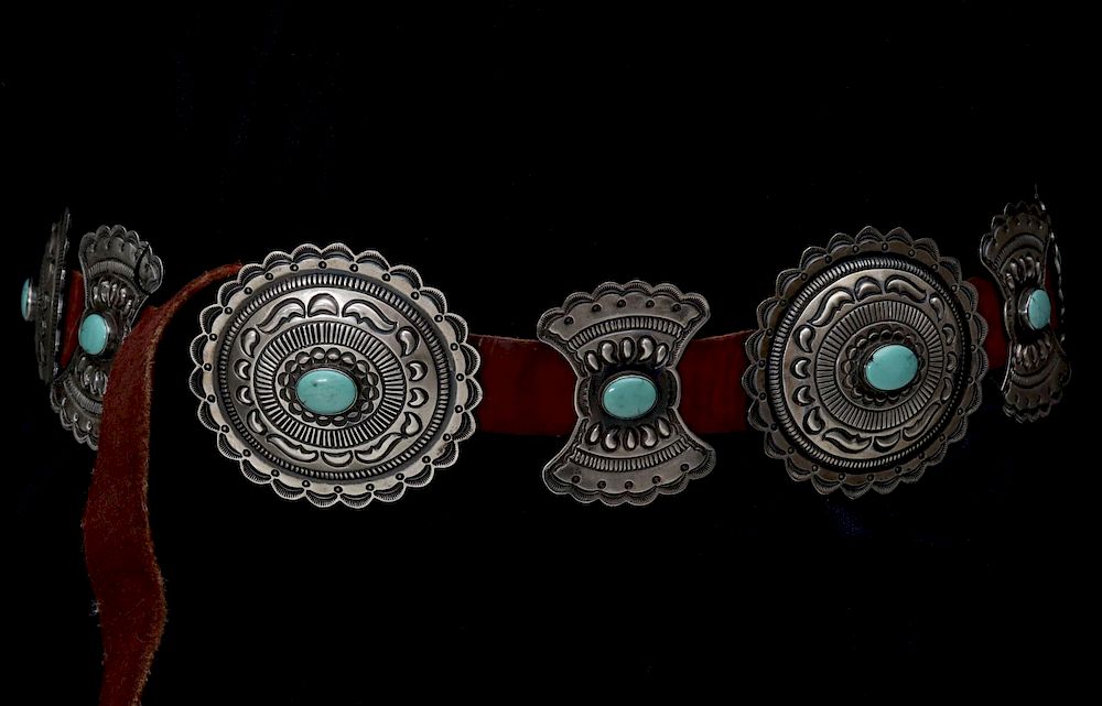 Appraisal: A KIRK SMITH STERLING TURQUOISE NAVAJO CONCHO BELT The scalloped