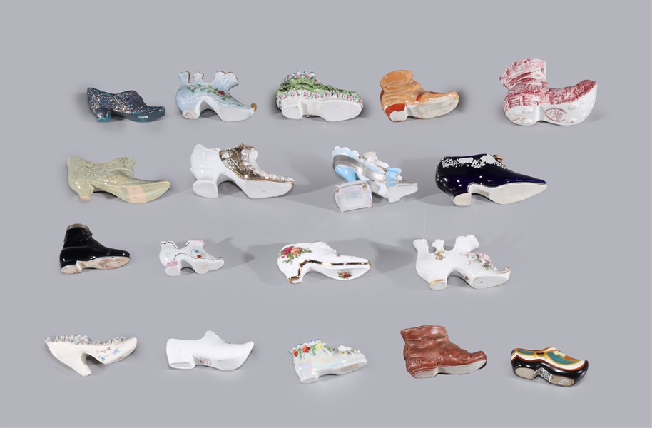 Appraisal: Group of twenty-six assorted decorative porcelain shoes as-is condition the