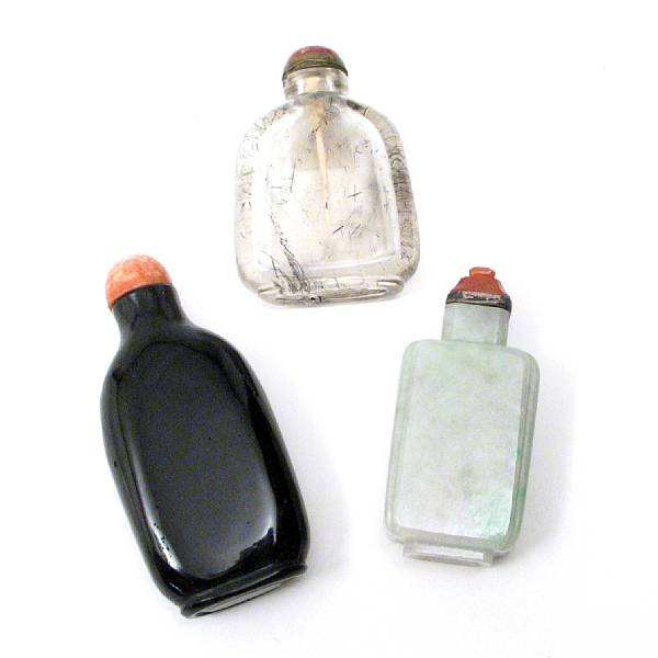 Appraisal: A group of three Chinese snuff bottles including hair crystal