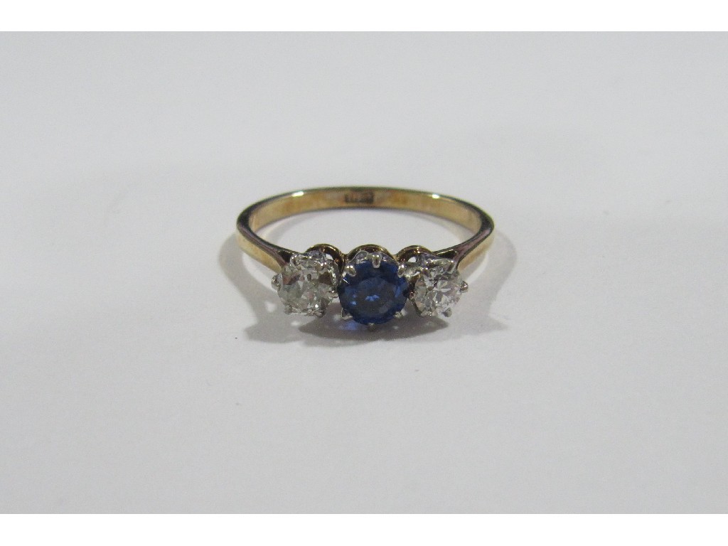 Appraisal: Eighteen carat gold and platinum sapphire and diamond three stone