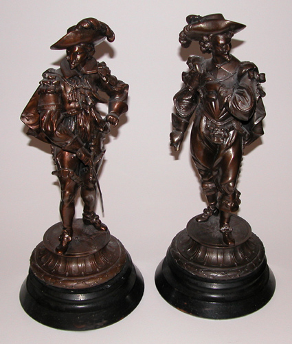 Appraisal: Pair of Costumed Cavaliers th Century th Century Decorative Sculpture