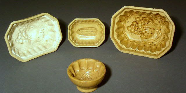 Appraisal: Four yellowware molds