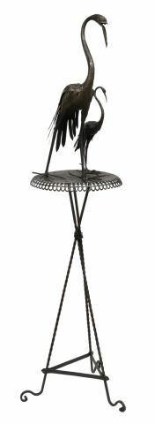 Appraisal: Unusual iron side table mid th c two cranes with