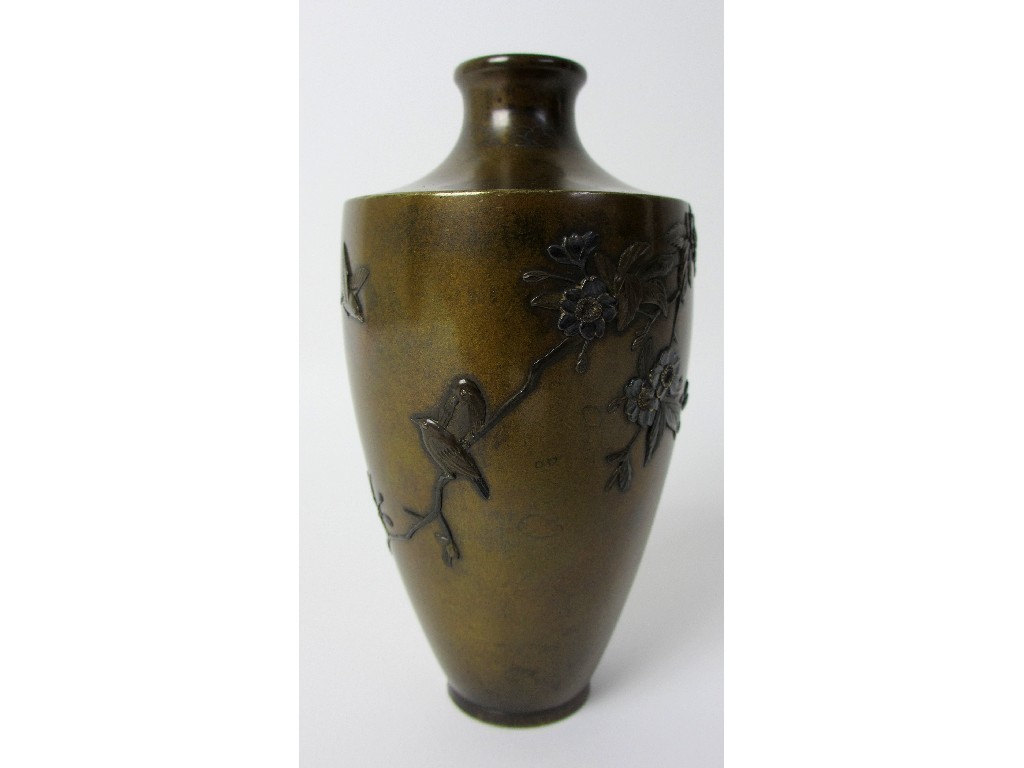 Appraisal: A Japanese bronze vase applied with birds amongst branches signed