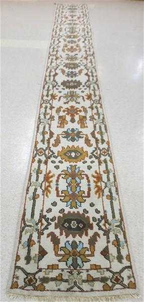 Appraisal: HAND KNOTTED ORIENTAL LONG RUG overall stylized floral design on