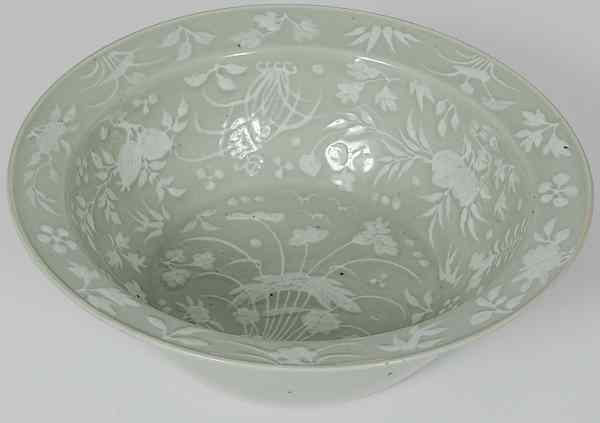 Appraisal: Celadon bowl Chinese a celadon bowl with floral interior decoration