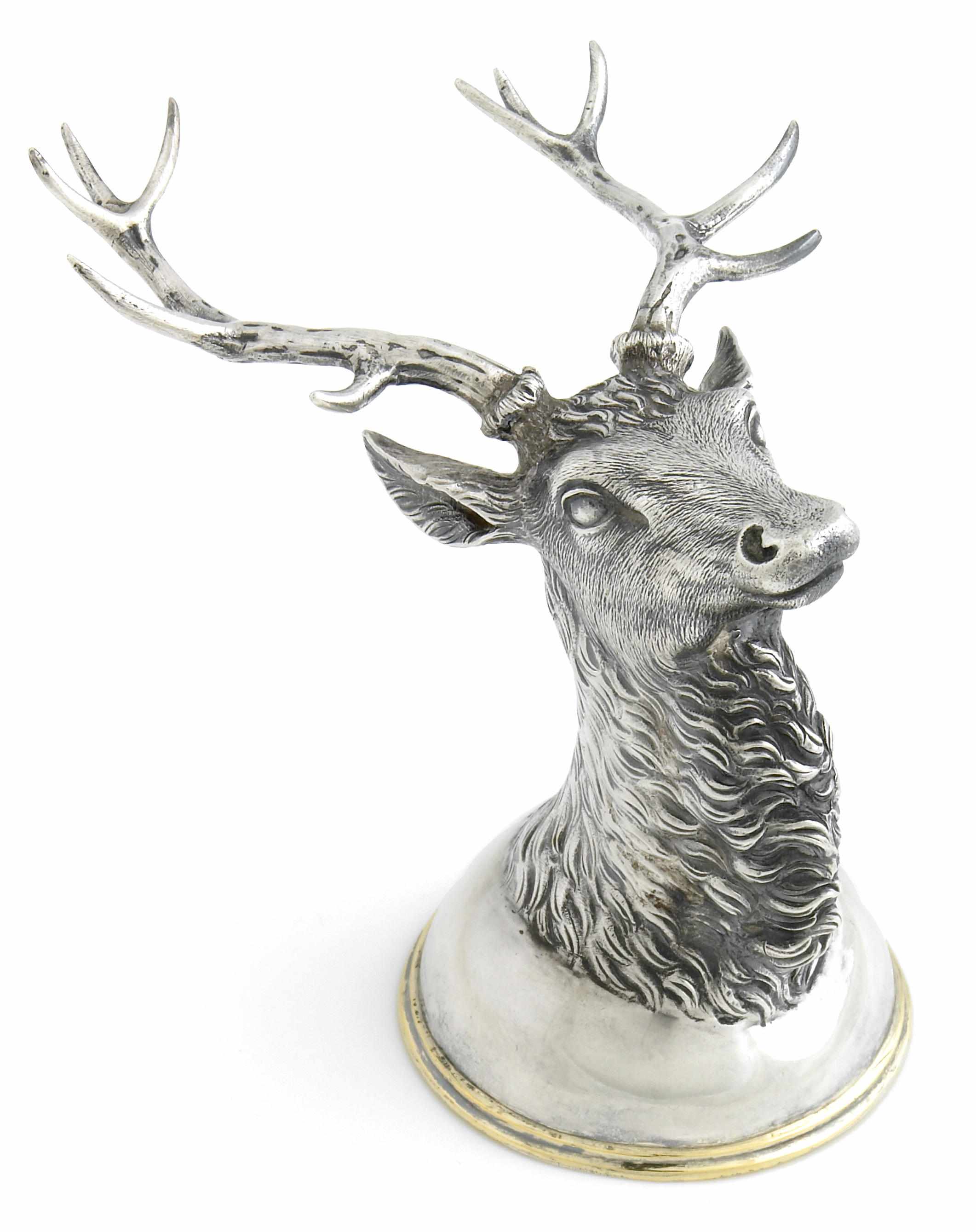 Appraisal: A Russian standard silver stirrup cup as a stag's head