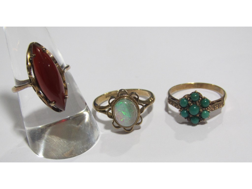 Appraisal: Three ct gold rings to include turquoise cluster opal single