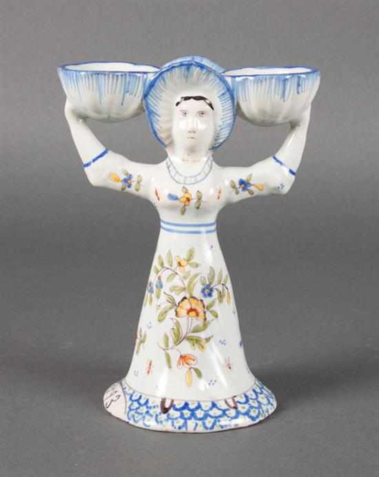 Appraisal: French faience figural open salt th century modeled as woman