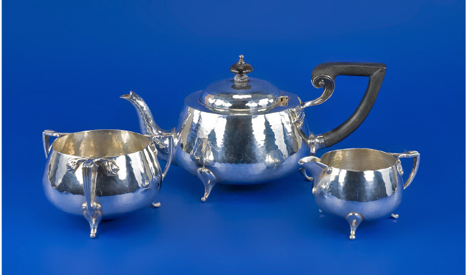 Appraisal: Arts And Crafts Three Piece Silver Tea Service Of Circular