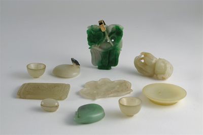 Appraisal: A Chinese jade carving of a finger citron and nine