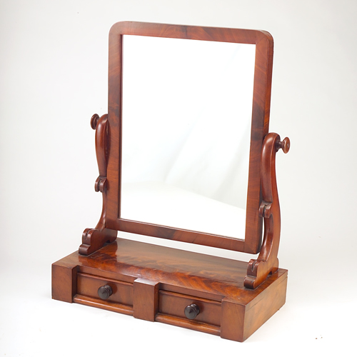 Appraisal: Mahogany dressing mirror with swivel mount and two drawers