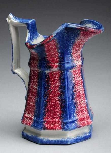 Appraisal: th Century Red Blue Spatterware Creamer Piece retains its original