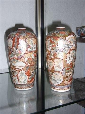 Appraisal: A PAIR OF SATSUMA VASES with panels depicting gryphons further