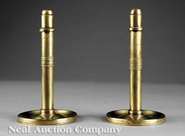 Appraisal: A Pair of Cornelius and Baker Brass Spring-Loaded Candlesticks mid-