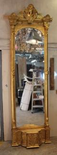 Appraisal: American Empire gilt pier mirror with focal female mask American