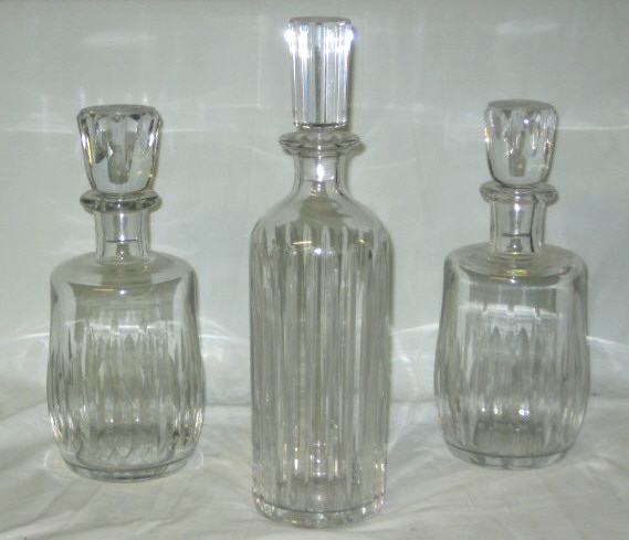 Appraisal: BACCARAT FRANCE Three crystal decanters a pair of Etna whiskey