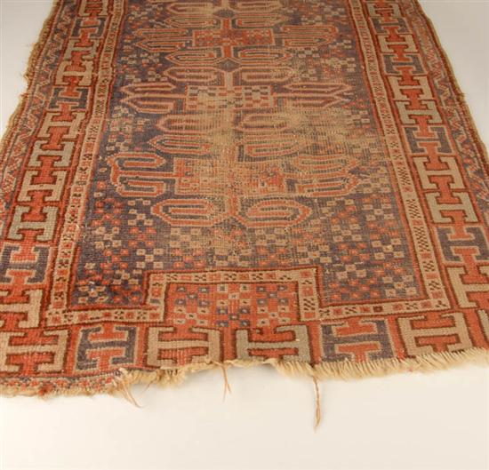 Appraisal: An Antique Caucasian Rug Worn ' x '