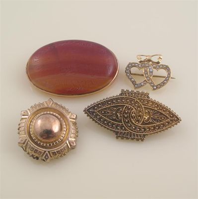 Appraisal: An agate brooch carved with Arabic script a Victorian ct