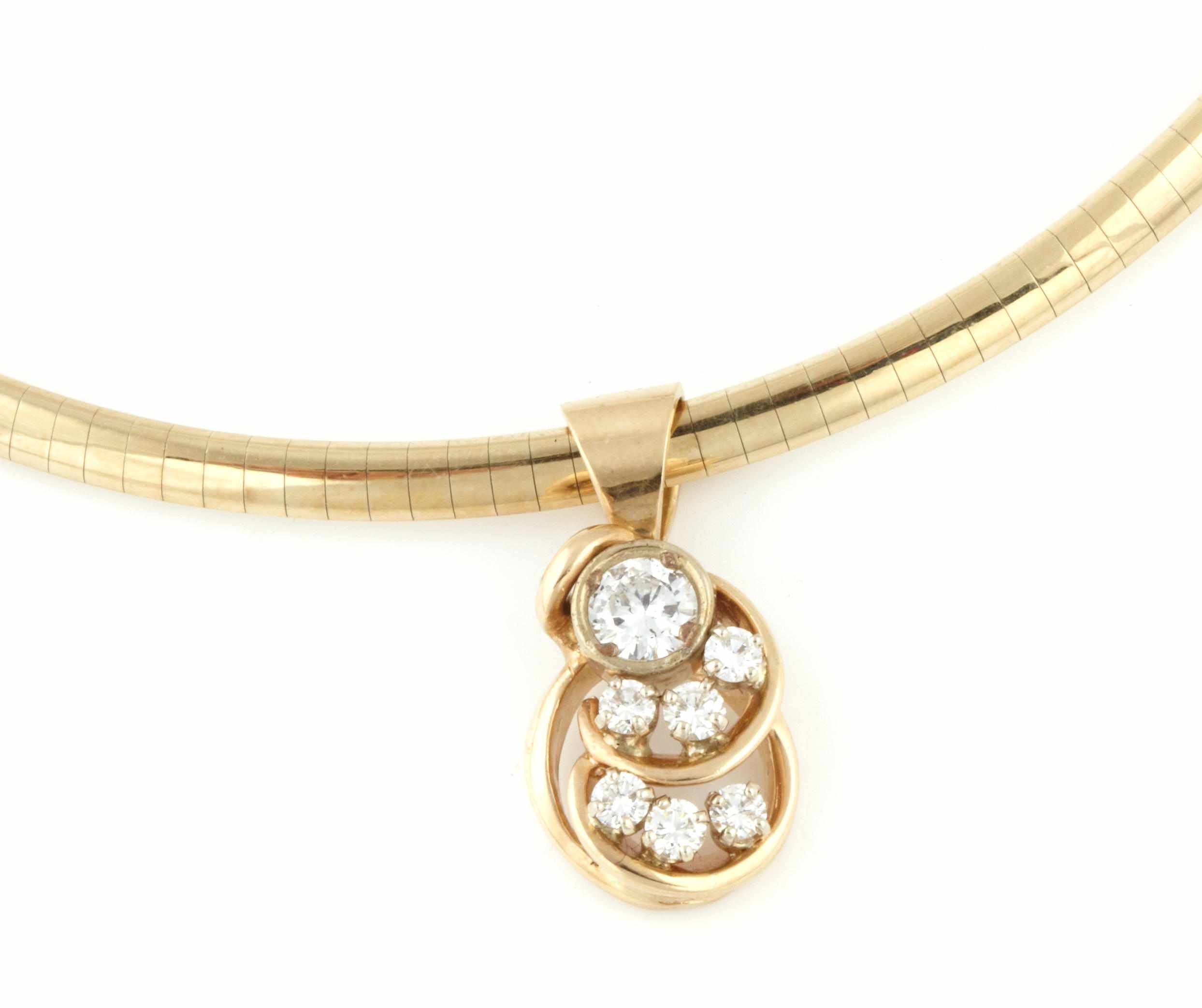 Appraisal: A diamond and gold slider pendant with a k gold