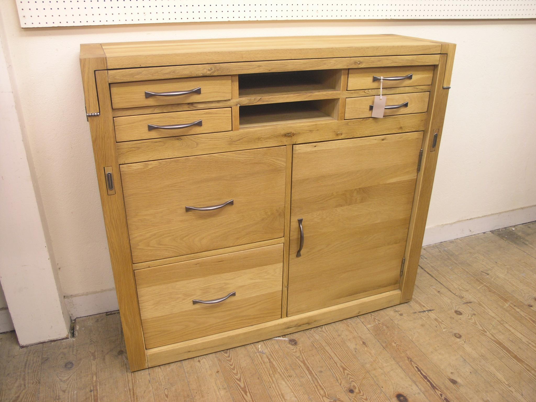 Appraisal: A Laura Ashley solid light oak desk unit folding top