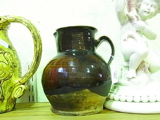 Appraisal: AN OLD HONEY GLAZED JUG marked Clee Hill Shropshire chipped