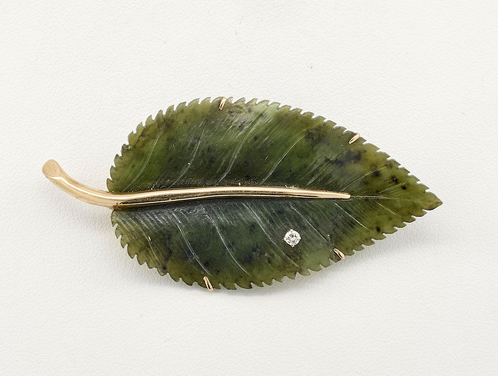 Appraisal: k Yellow gold diamond carved jade leaf brooch k Yellow