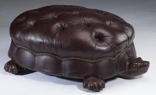 Appraisal: Contemporary button Contemporary carved mahogany and leather ottoman resembling a