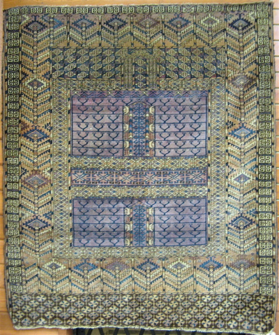 Appraisal: ANTIQUE TURKOMAN PRAYER RUG the central field divided into quarters