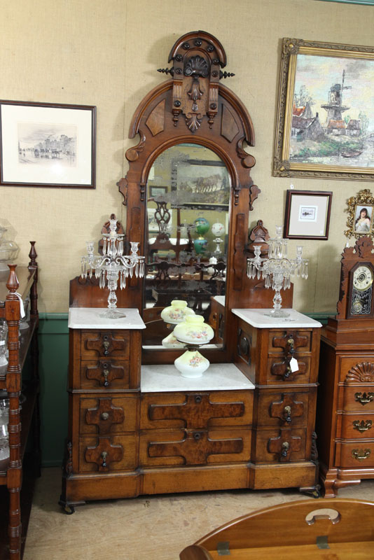 Appraisal: VICTORIAN DRESSER Walnut with burlwood accents Large arched and carved