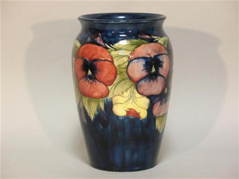 Appraisal: MOORCROFT ART POTTERY VASE Impressed marks and blue Moorcroft signature